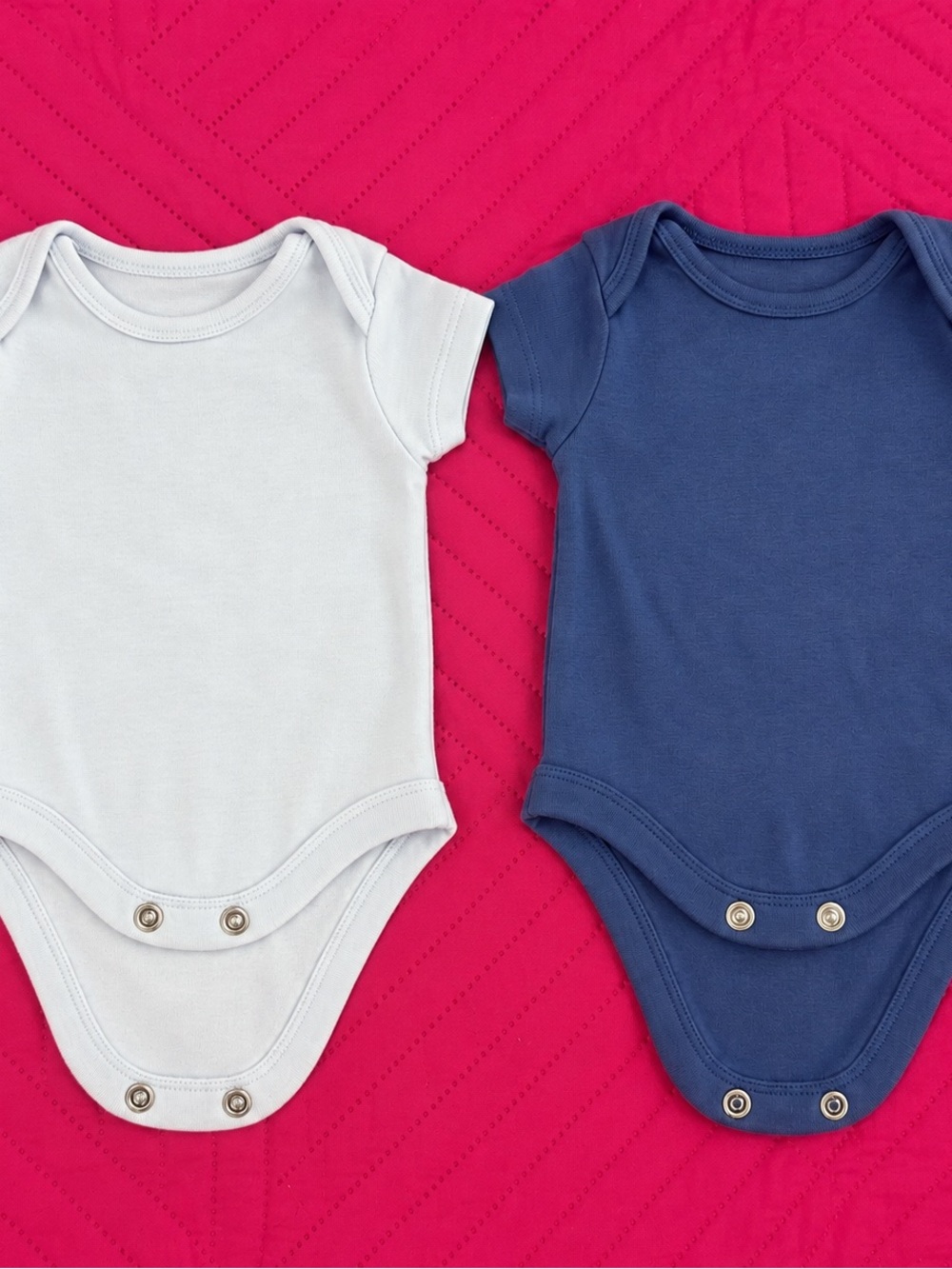 Classic Two-Pack Baby One-Piece Bodysuits in White and Navy